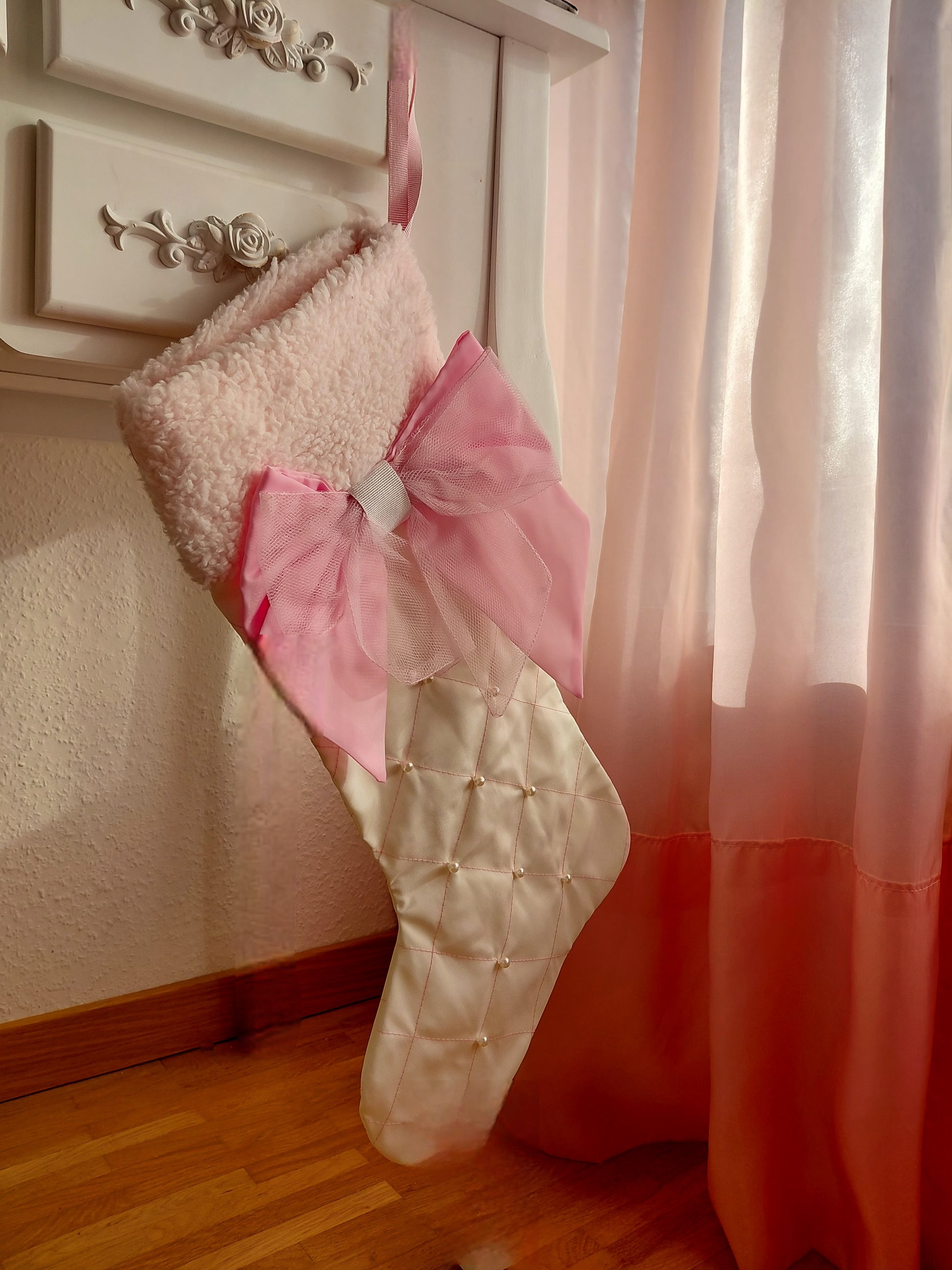 Decorative white stocking with pink bow  (example of interior use)