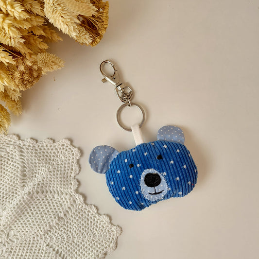 Blue teddy bear keychain with white polka dots 