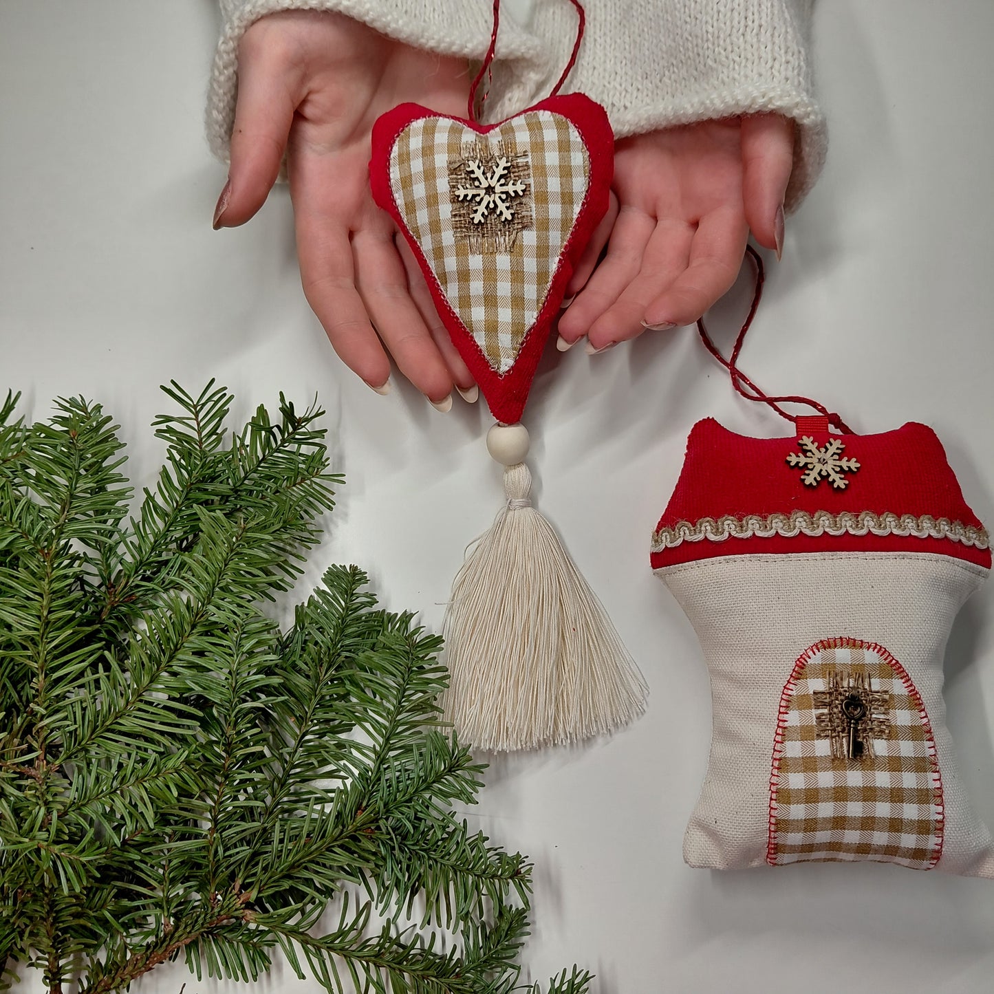 Heart-shaped fabric ornaments with tassels 