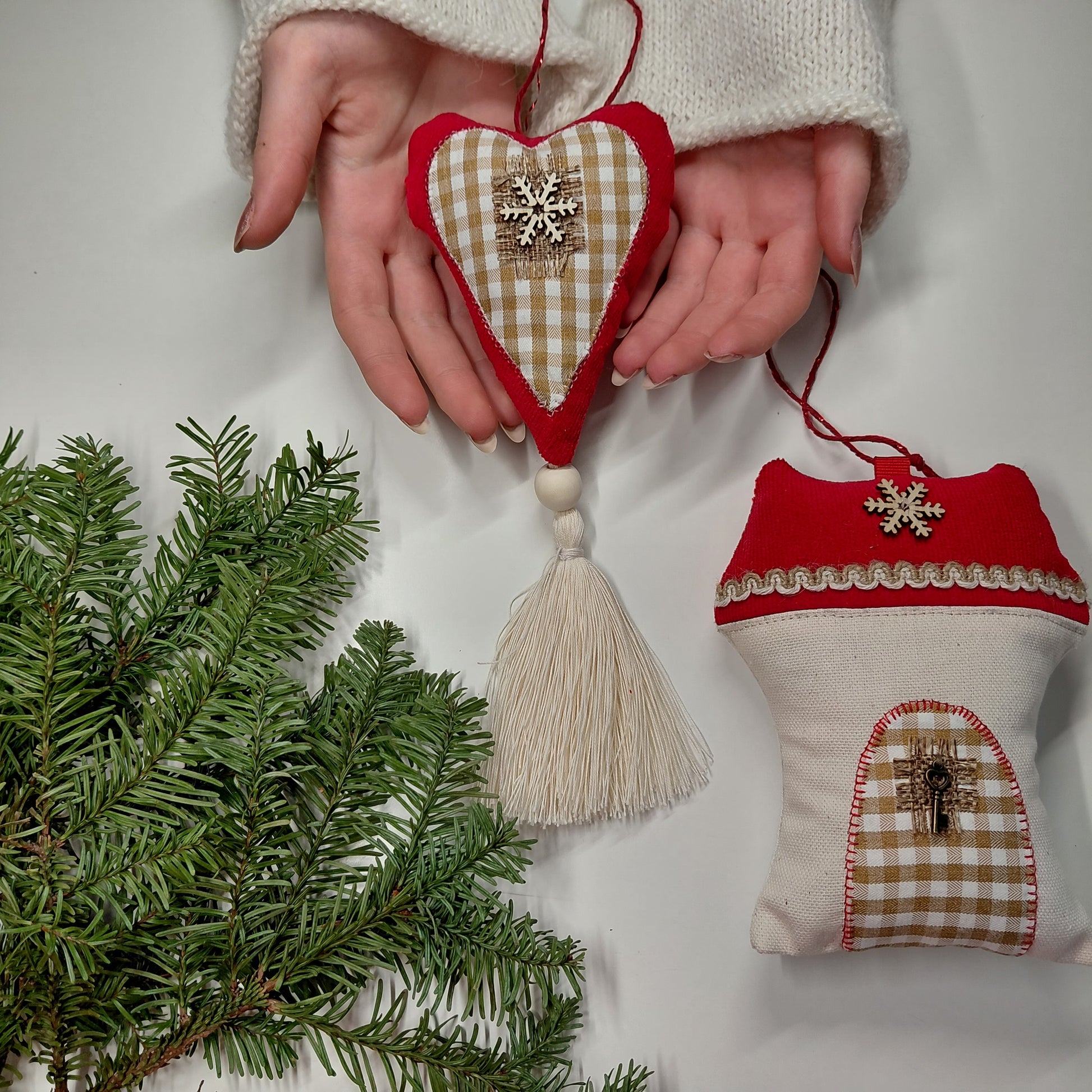 Heart-shaped fabric ornaments with tassels 